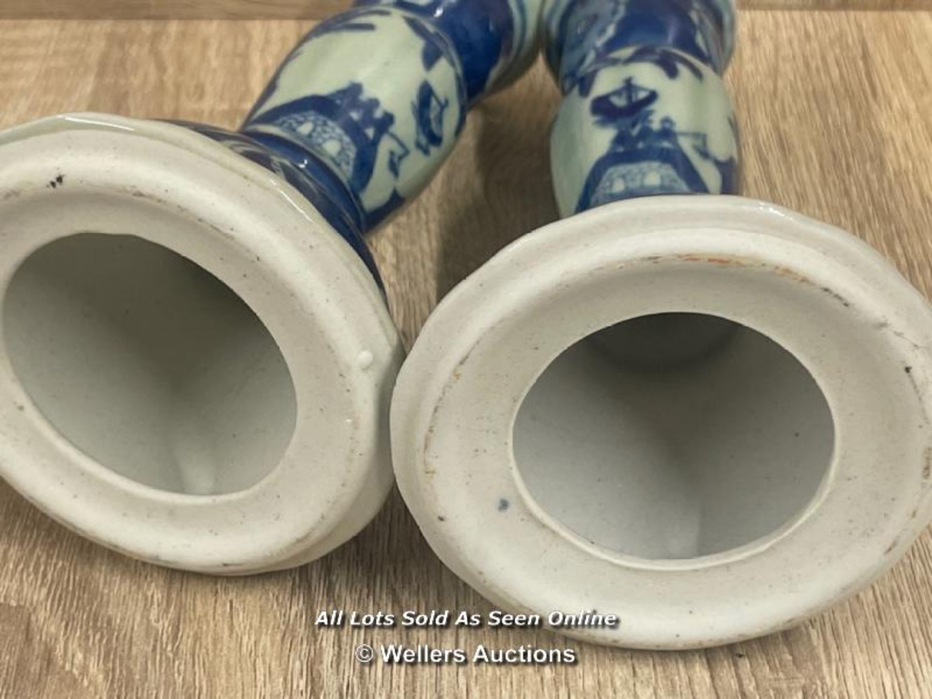 A PAIR OF CHINESE BLUE & WHITE CANDLE HOLDERS DECORATED WITH SCENERY.17.6CM HIGH - Image 4 of 4