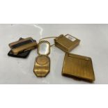 BRASS COMPACT MODELLED AS A HANDBAG; STRATTON ART DECO COMPACT; HOUBIGANT COMPACT AND ONE MORE