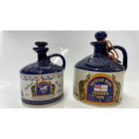 TWO CERAMIC BOTTLES FOR PUSSERS RUM (EMPTY)