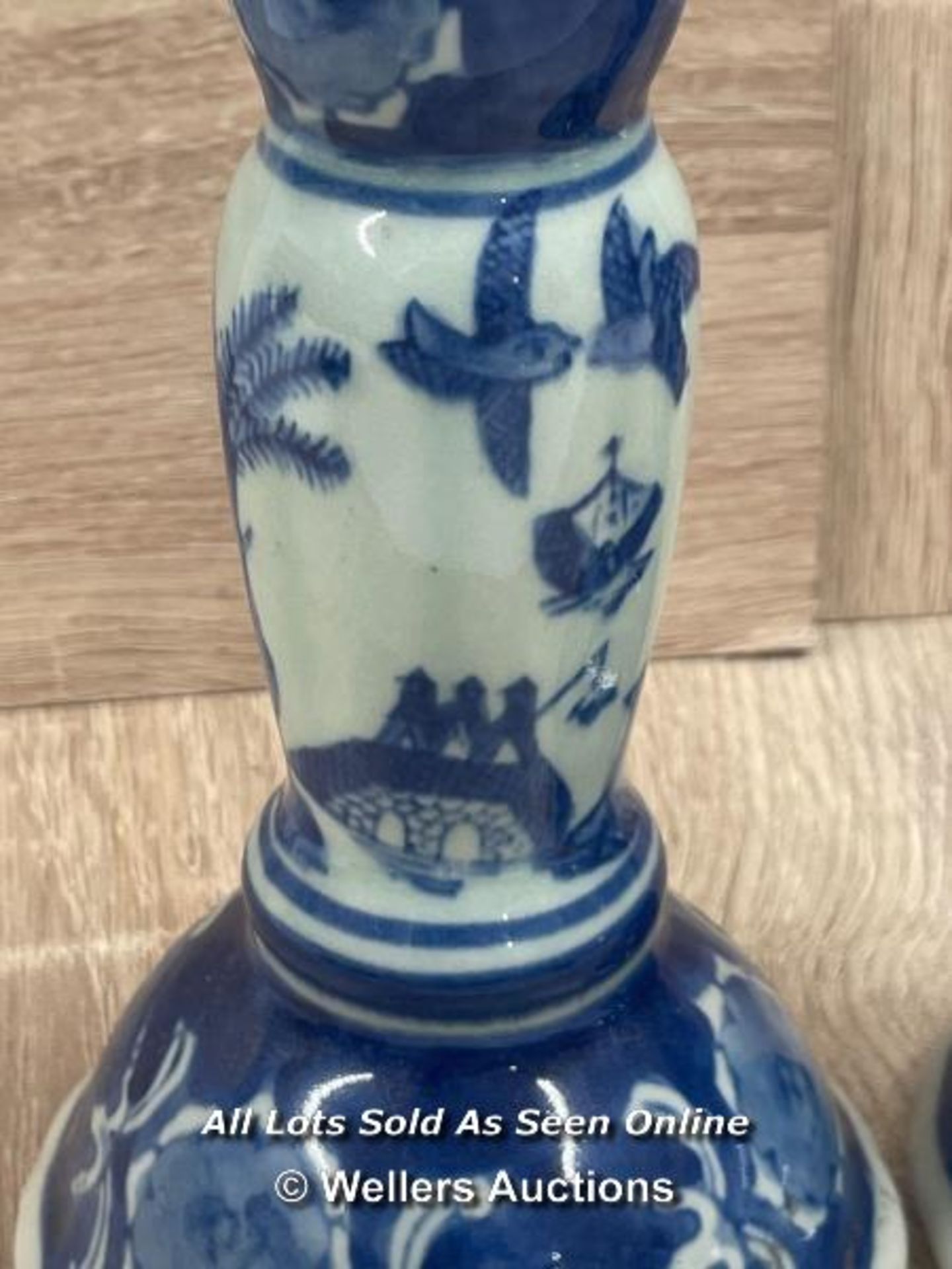 A PAIR OF CHINESE BLUE & WHITE CANDLE HOLDERS DECORATED WITH SCENERY.17.6CM HIGH - Image 2 of 4