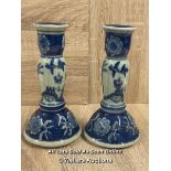 A PAIR OF CHINESE BLUE & WHITE CANDLE HOLDERS DECORATED WITH SCENERY.17.6CM HIGH