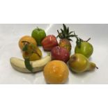 10 PIECES OF NATURALISTICALLY MOULDED FRUIT, PORCELAIN AND PLASTIC