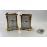 TWO ENGLISH MADE BRASS CARRIAGE CLOCKS WITH WHITE ENAMEL DIALS