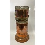 COPPER TWIN HANDLED STICK STAND WITH PIERCED DECORATION