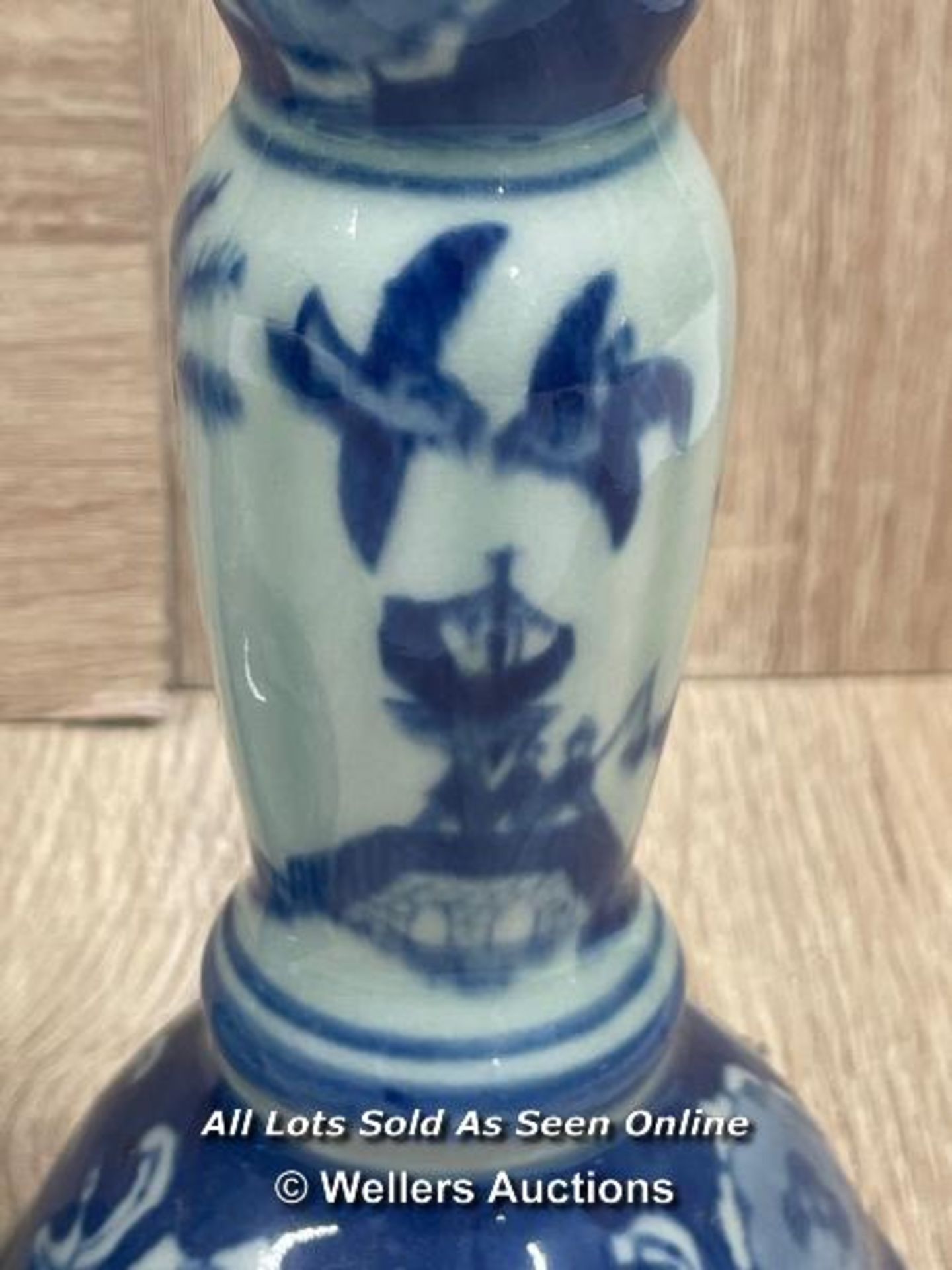 A PAIR OF CHINESE BLUE & WHITE CANDLE HOLDERS DECORATED WITH SCENERY.17.6CM HIGH - Image 3 of 4