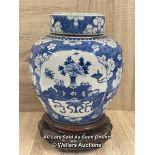 A LARGE CHINESE BLUE & WHITE GINGER JAR. 28CM HIGH INCL. STAND. THE LID HAS BEEN REPAIRED