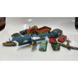 TINPLATE TOYS: HAJI BIPLANE, DIBRO POLICE CAR, SOLIDO JAGUAR AND OTHERS