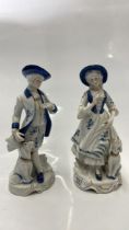PAIR OF LEONARDO COLLECTION BLUE AND WHITE FIGURINES