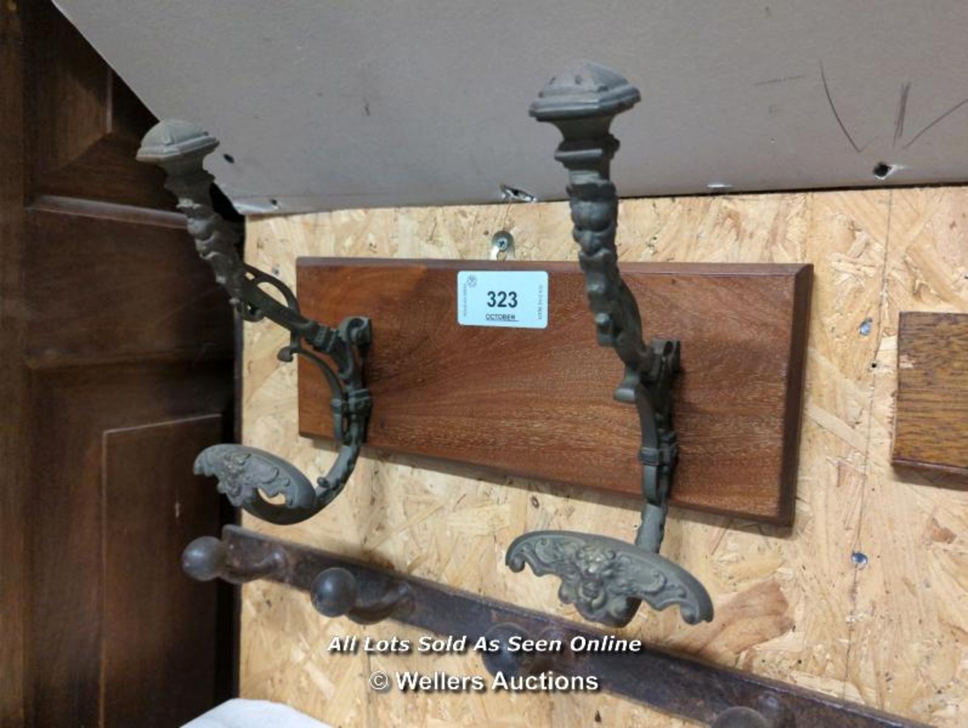 PAIR OF LARGE PERIOD BRASS FRENCH COAT HOOKS ON BACK BOARD