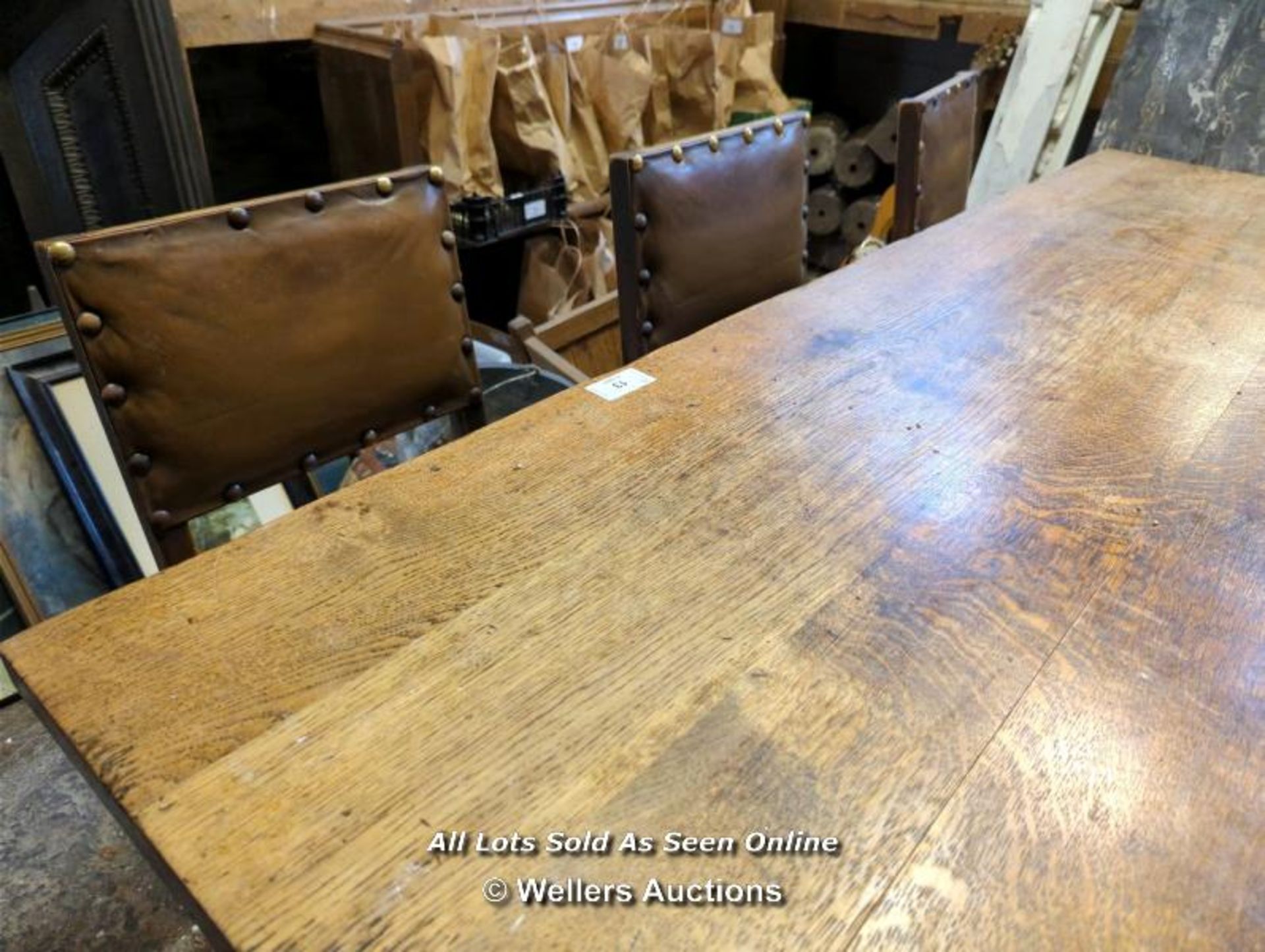 OAK TABLE AND EIGHT LEATHER BOUND CHAIRS - 29" H X 78" L X 3' W - Image 3 of 6