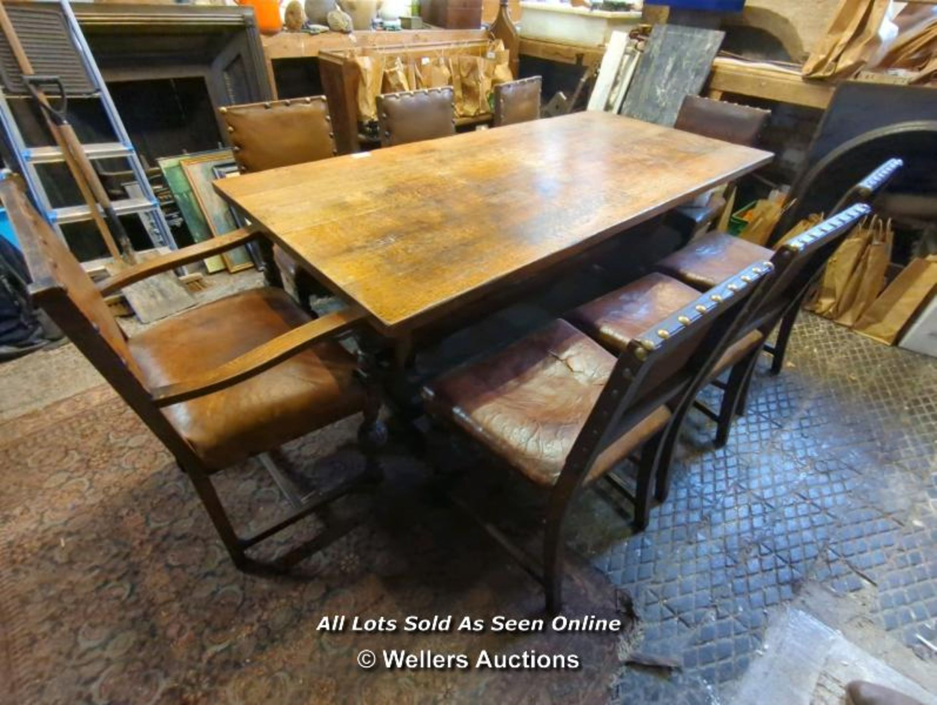 OAK TABLE AND EIGHT LEATHER BOUND CHAIRS - 29" H X 78" L X 3' W - Image 2 of 6