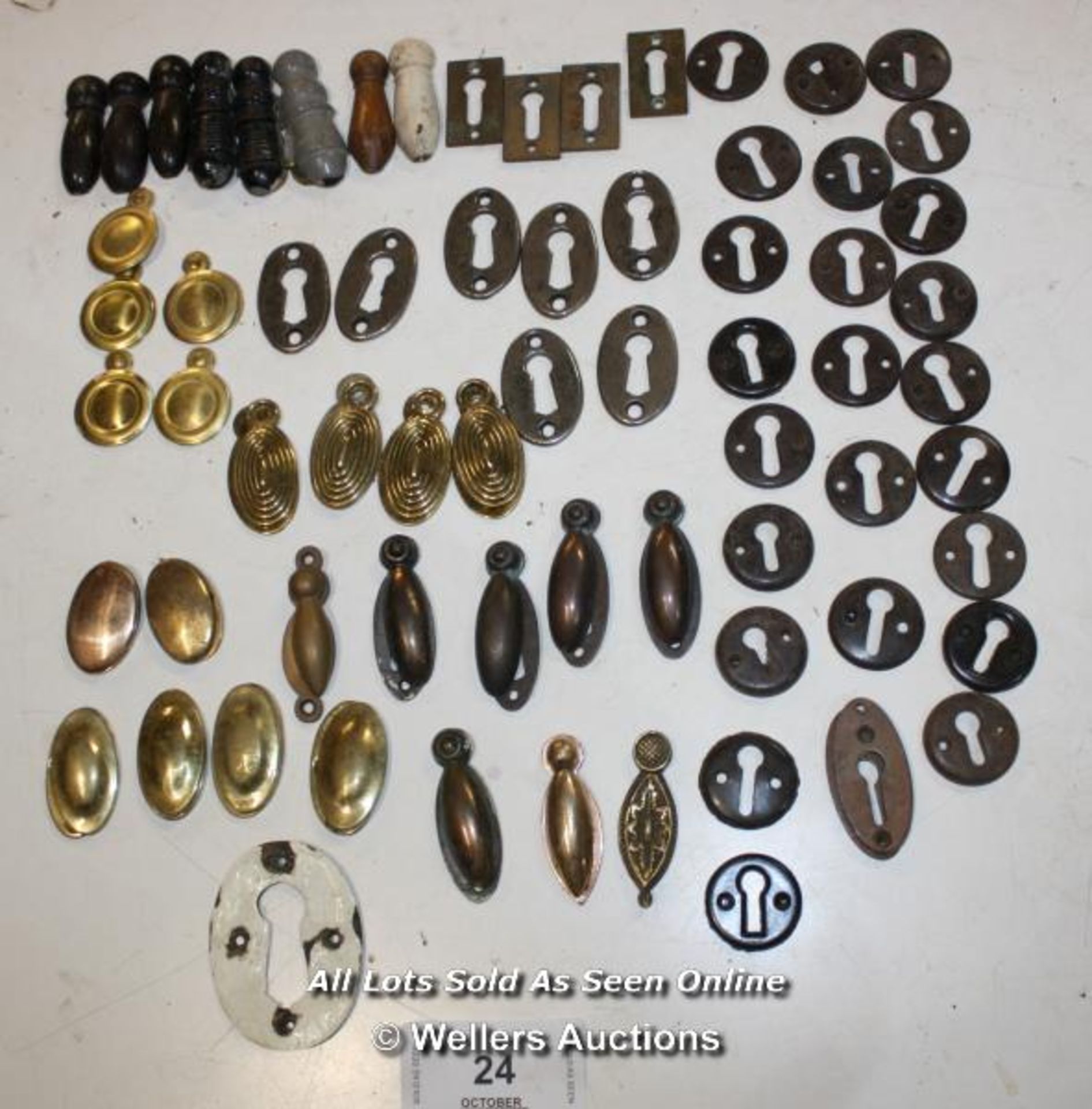 ASSORTMENT OF BRASS WOODEN AND BAKELITE ESCUTCHEONS AND BACK PLATES