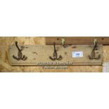 SET OF THREE COAT HOOKS ON BACK BOARDS