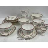 A PART MINTON BREAKFAST SERVICE INCLUDING MUGS, EGG CUPS, PLATES AND BOWLS. SOME PARTS HAVE BEEN