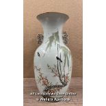 A LARGE JAPANESE VASE DECORATED WITH DETAILED BIRDS AND FLOWERS, DAMAGE TO ONE OF THE FINIALS.