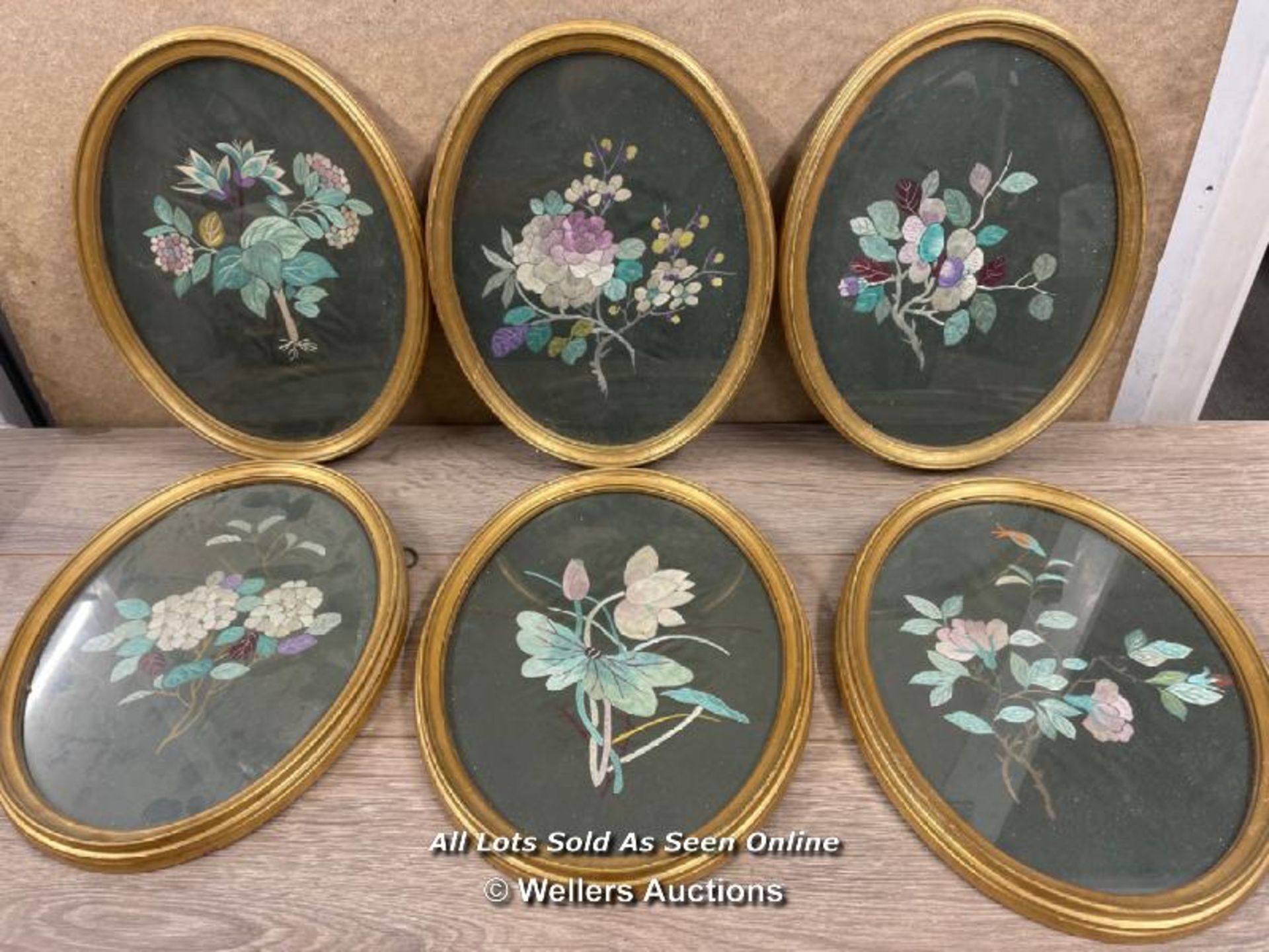 A SET OF SIX OLD CHINESE SILK EMBROIDERY FLOWERS IN OVAL FRAMES. 26 X 33 CM