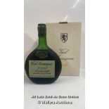 A VINTAGE BOTTLE OF VIEIL ARMAGNAC V.S.O.P 24 FLOZ, 70 % PROOF, UNOPENED THOUGH THE WAX SEAL IN