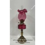 BRASS COLUMN OIL LAMP WITH CRANBERRY GLASS FONT - SHADE, CONVERTED TO ELECTRICITY 64.5CM HIGH