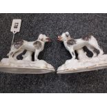 PAIR OF 19TH CENTURY PORCELAIN DOGS
