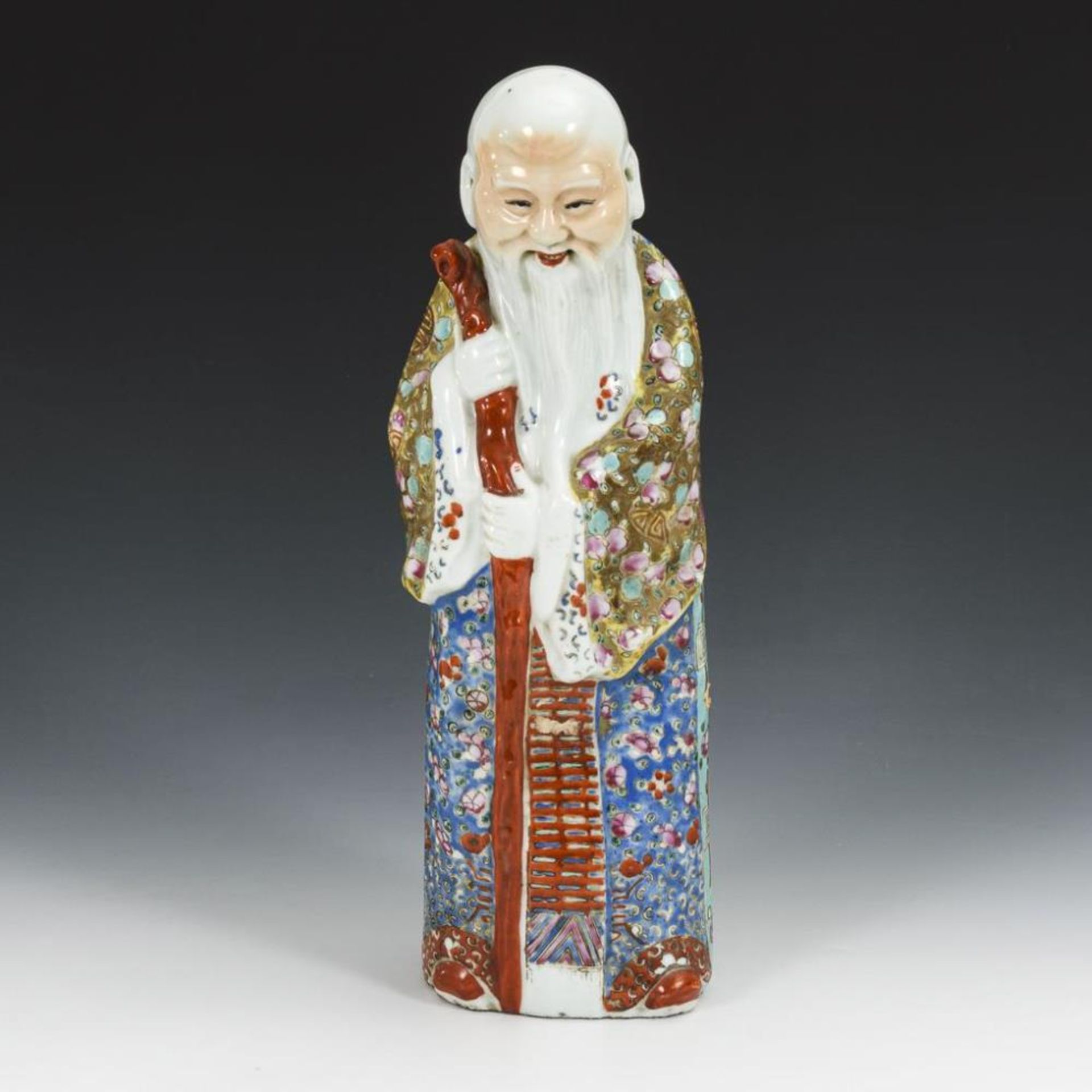 Große Porzellanfigur eines chinesischen Weisen