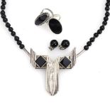 Collier und 2 Ringe mit Onyx.