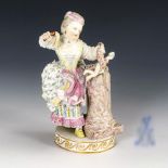 Rokokomädchen mit Puppe. Meissen.