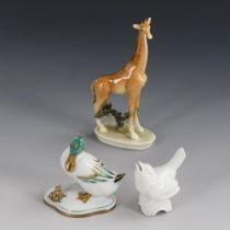 3 Miniaturtiere: Giraffe, Spatz und Ente.