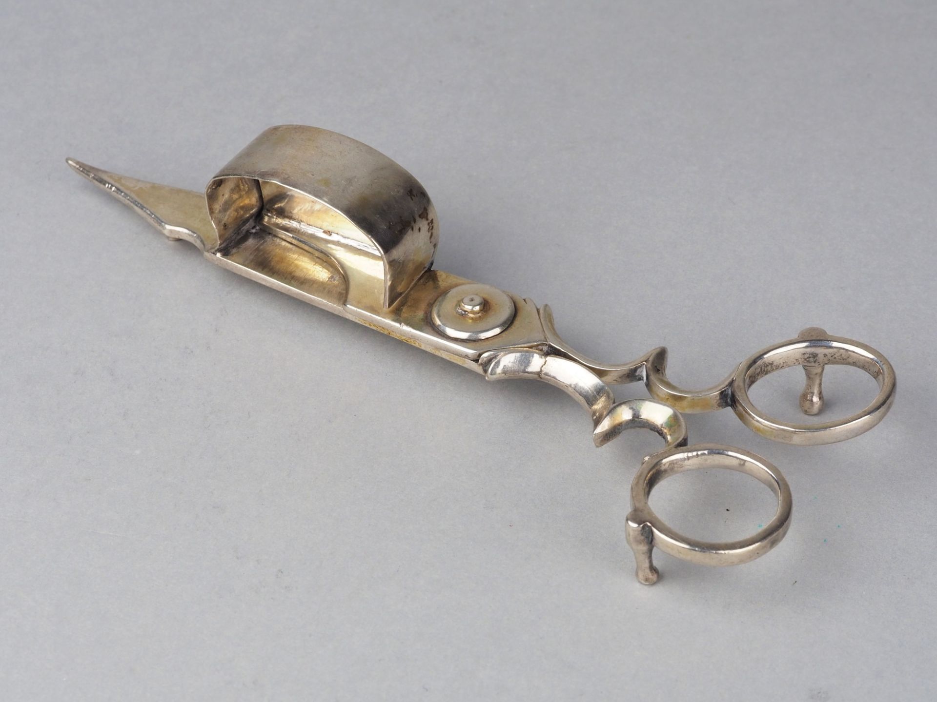 Silver plated candle snuffer, 19th c.