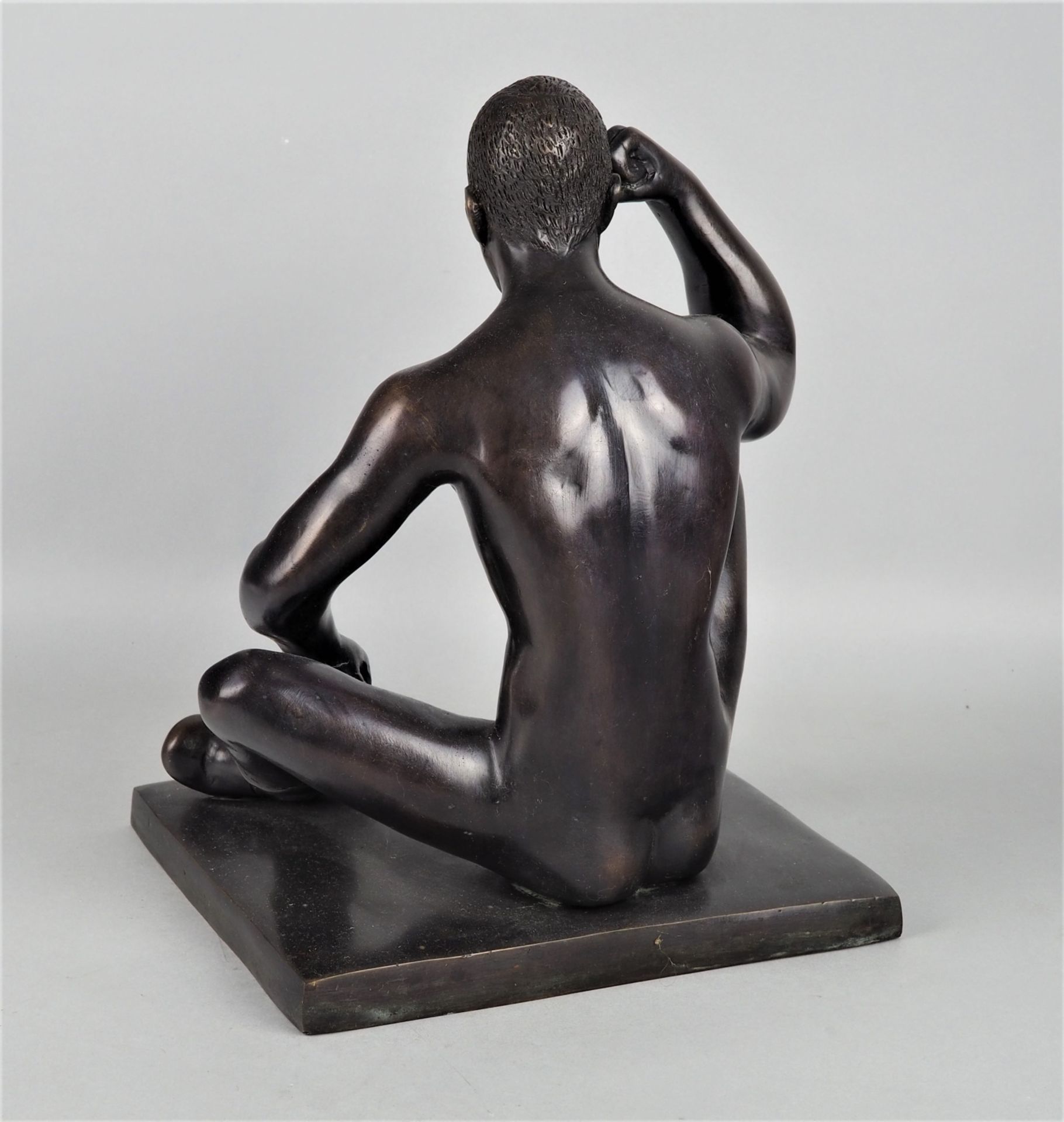 Sitting male nude with leather boots, bronze figure - Image 2 of 2