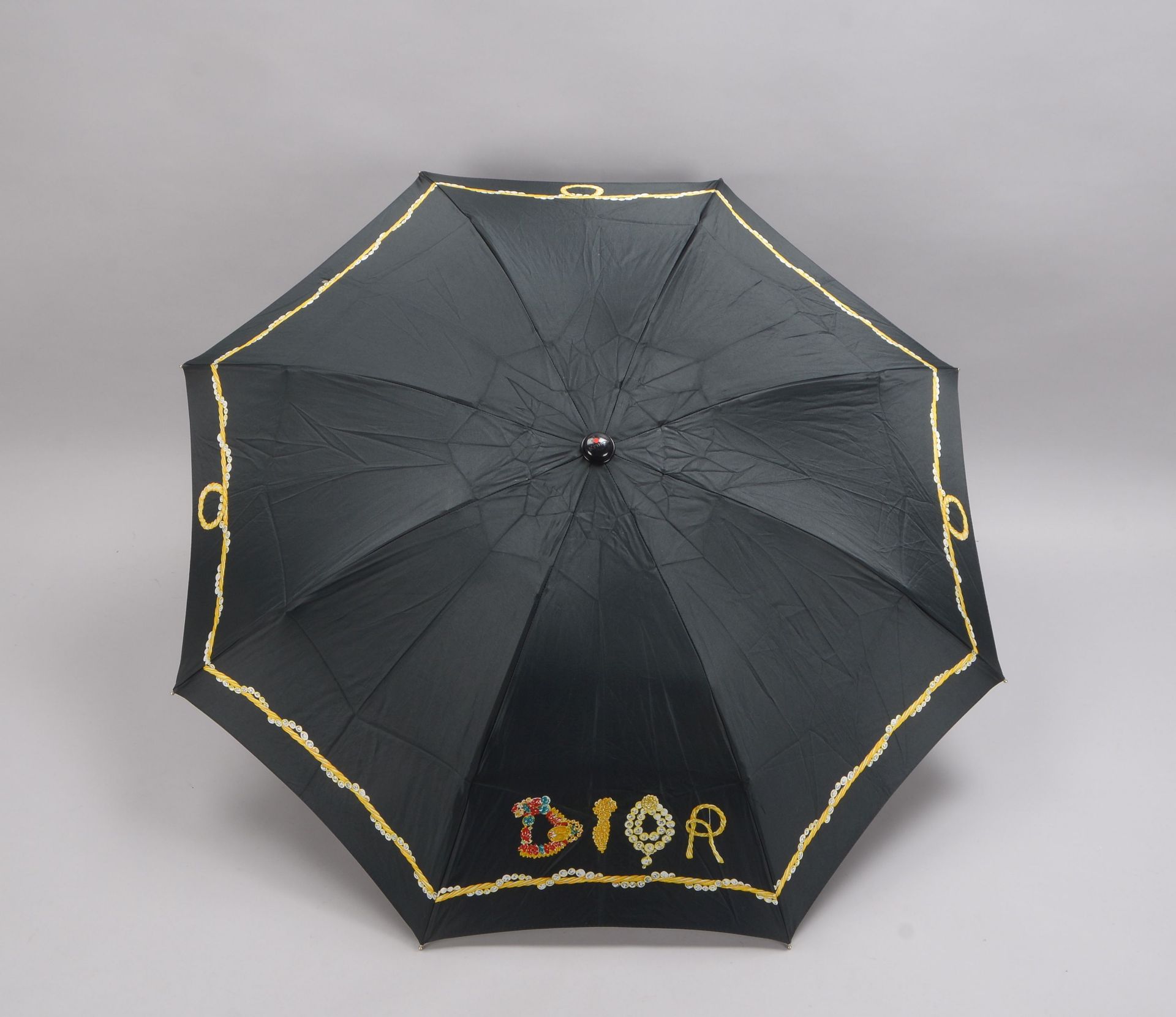 Dior, Designer-Regenschirm, mit verspieltem Randdekor und buntem Namenszug in Schmuck-Anmutung, Schi - Bild 2 aus 2