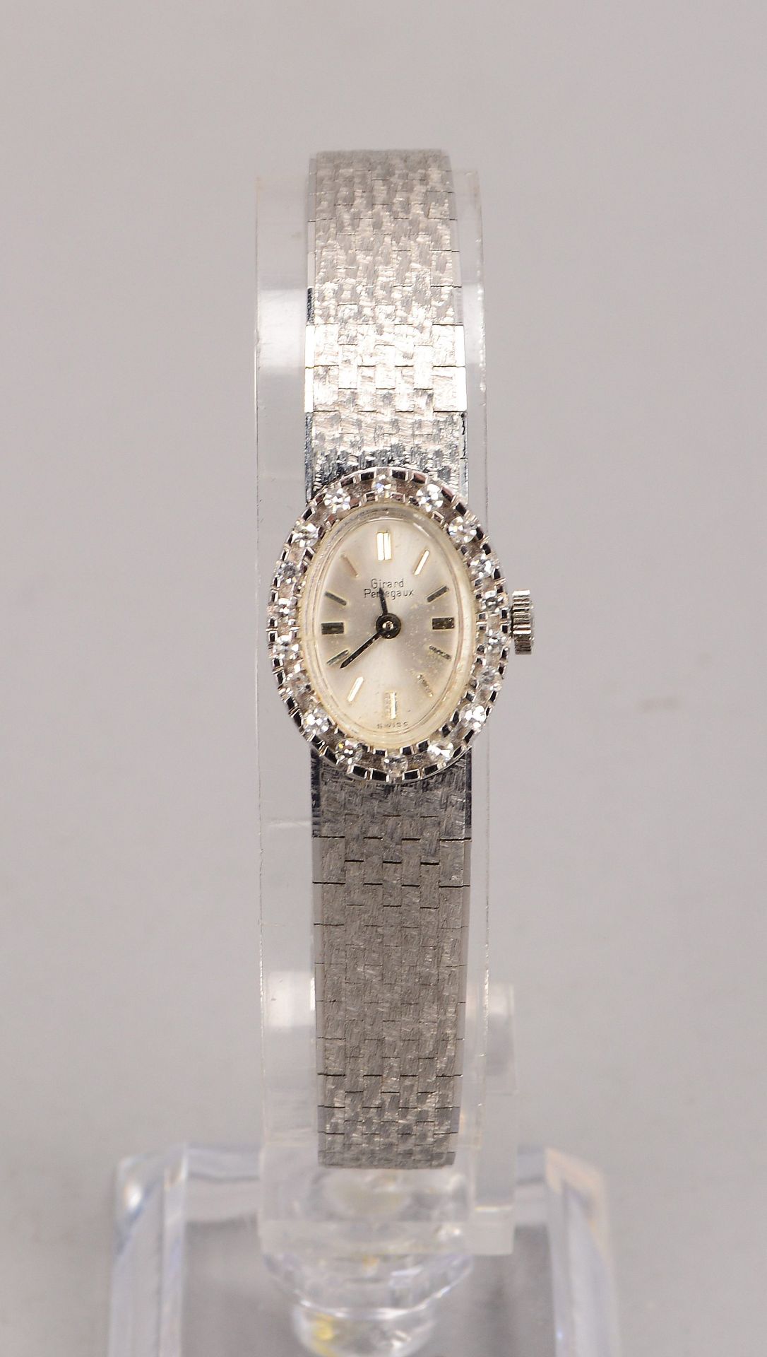 Damenarmbanduhr, Girard Perregeaux, 750 WG-Gehäuse und Armband (gestempelt), Handaufzug, mit Diamant