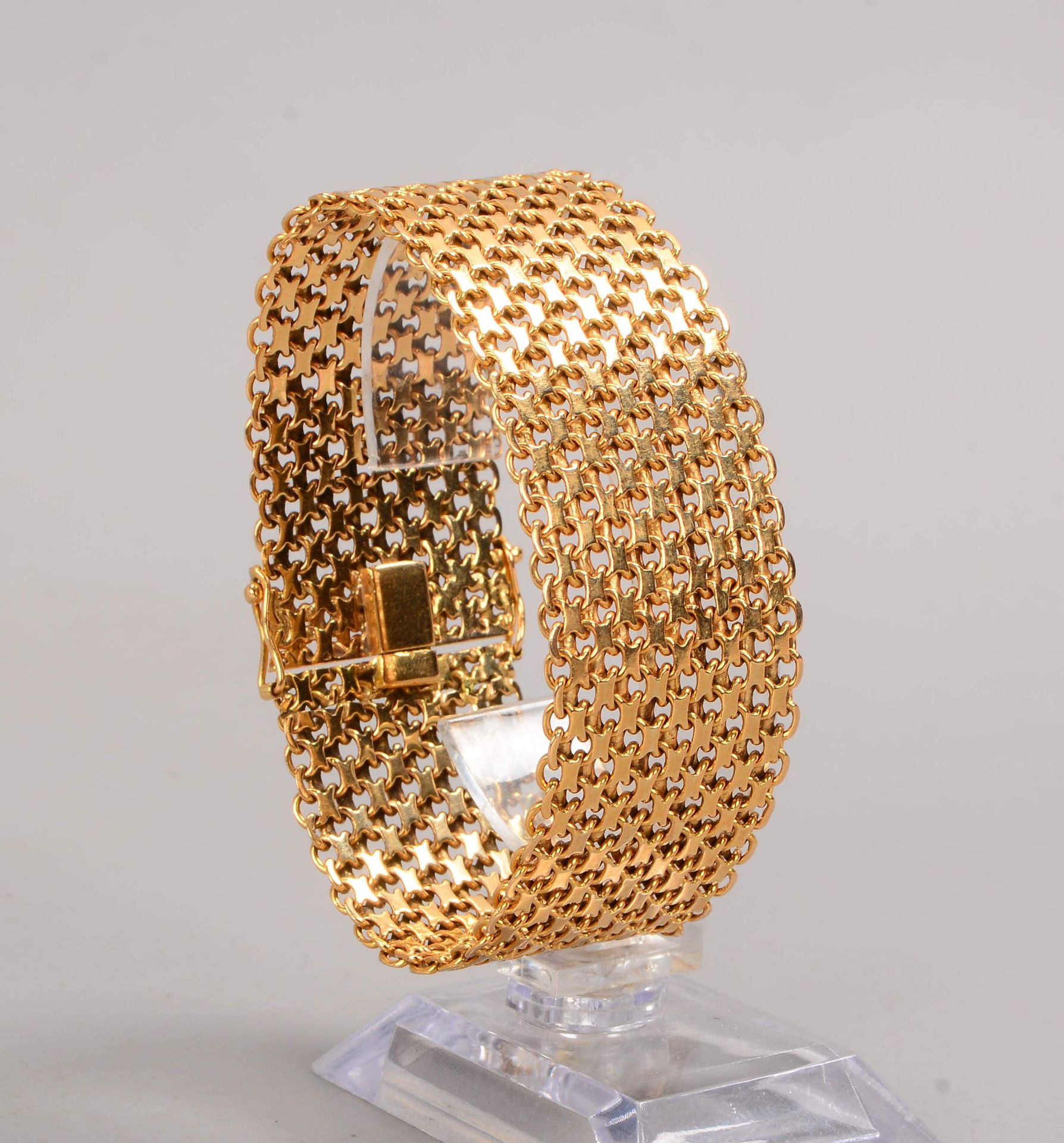 Armband, 18 kt GG (geprüft - 2-fach punziert/ungedeutet), mit Steckschließe; Gewicht 60,50 g