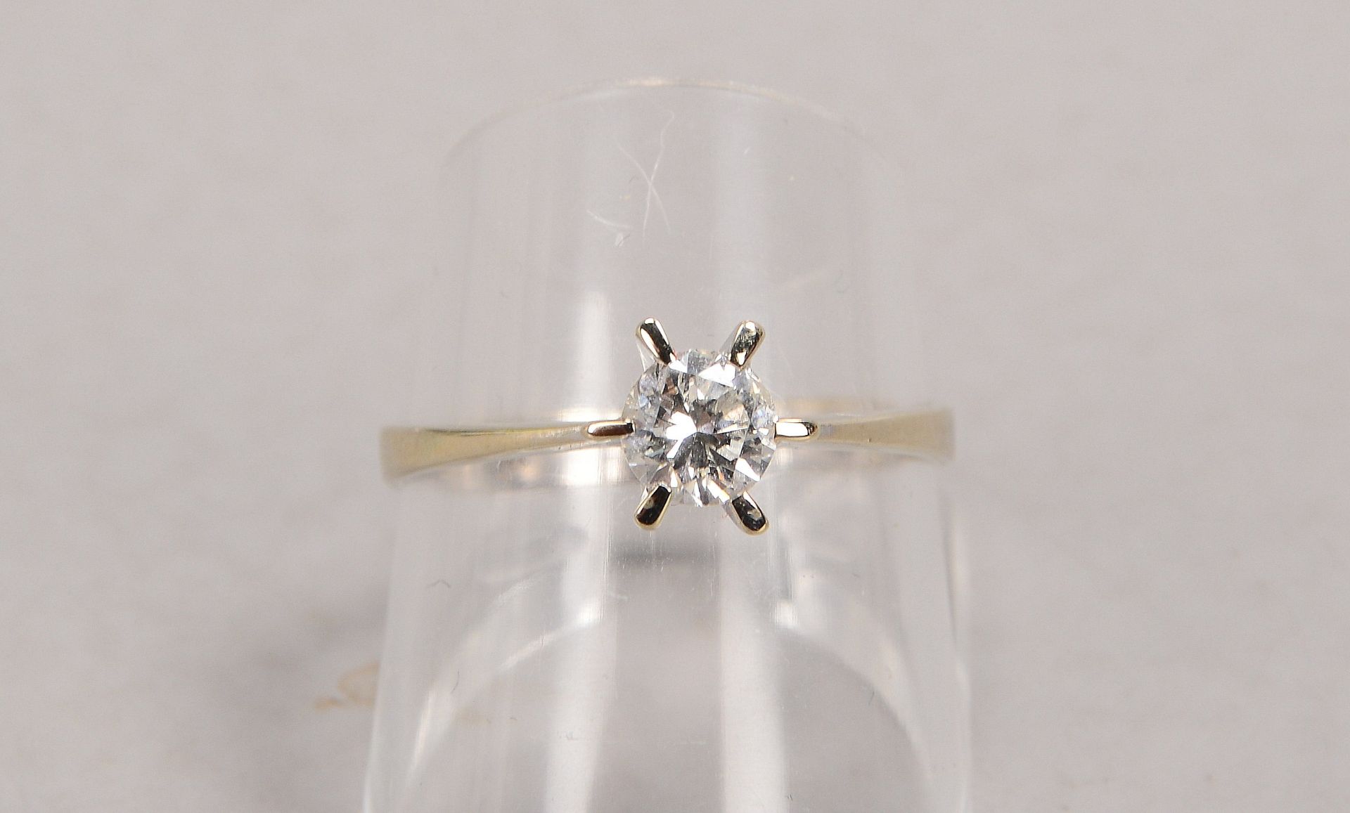 Solitärring, 585 WG (gestempelt), besetzt mit einzelnem Brillant von ca. 0,50 ct, Farbe Weiß-Vsi