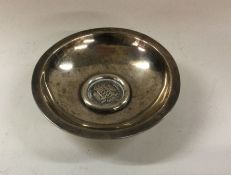 A Maltese silver dish. Est. £50 - £80.