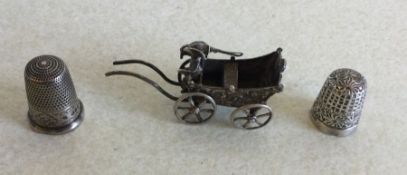 A small Continental silver table toy together with