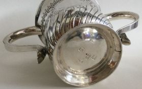 A heavy Georgian silver two handled porringer with