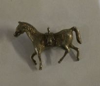 A silver model of a horse. Approx. 20 grams. Est. £20 - £30.