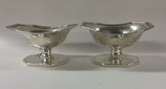 A pair of finely George III engraved silver salts.