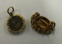 A small Antique pendant together with a brooch. Ap