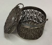 An unusual filigree bougie box with wirework decor