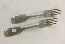 A pair of Victorian silver fiddle pattern forks. A