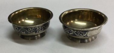 A good pair of silver and silver gilt salts with N
