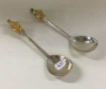 A pair of silver anointing spoons with dragon term