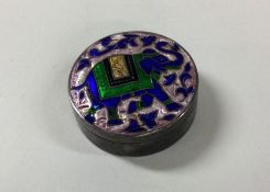 A silver and enamel elephant pill box. Approx. 20