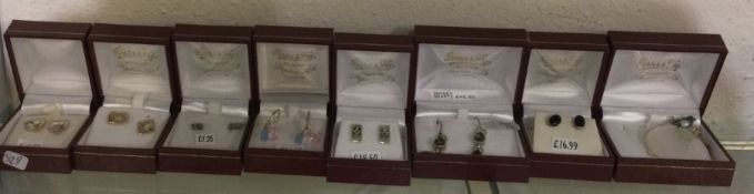Eight pairs of silver earrings. Est. £20 - £30.