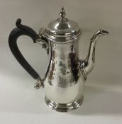 A Georgian silver baluster shaped coffee pot with