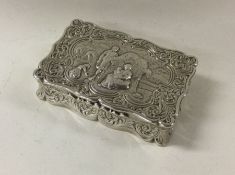 A chased silver snuff box with Victorian scene dec