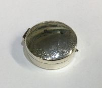 A rectangular hinged silver pill box. Approx. 13 grams.