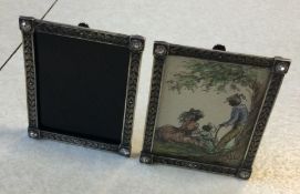 A pair of silver picture frames. Est. £40 - £60.