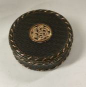 A gold mounted and tortoiseshell box. Approx.